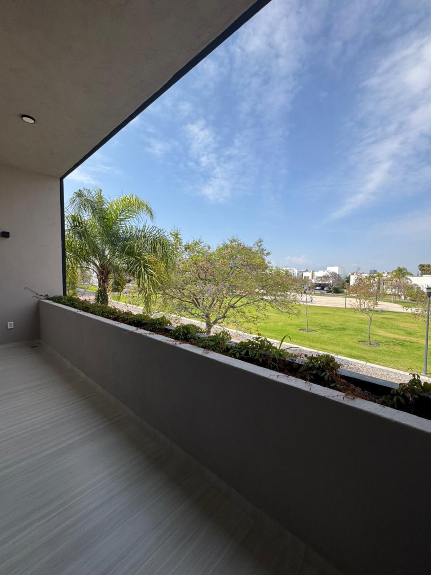 Balcón con vista al parque